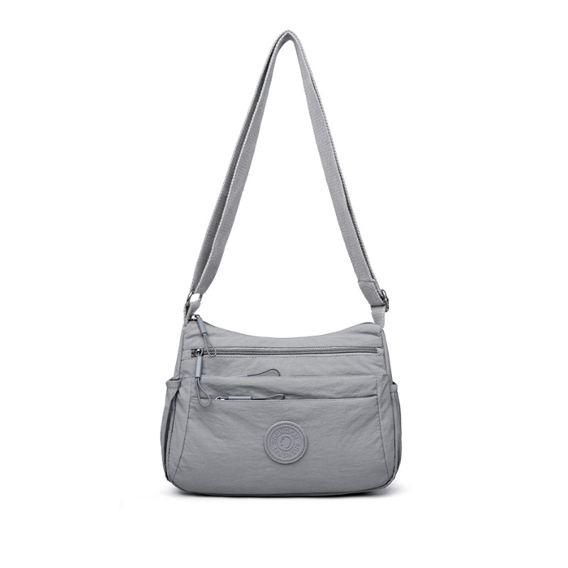 The Silhouette Slide Crossbody Bag