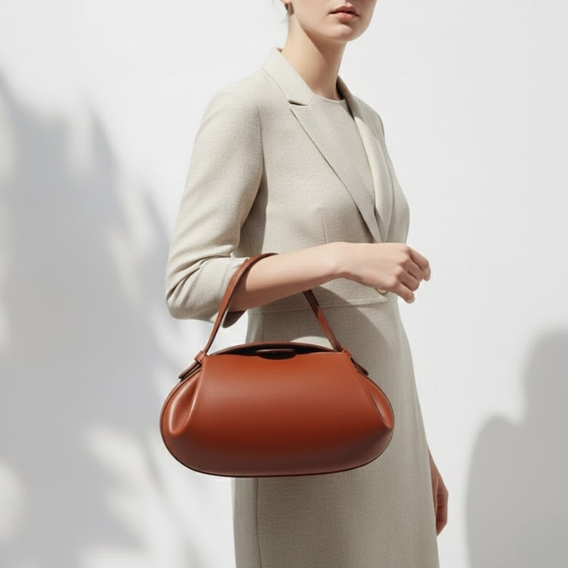 Minimalist Sculptural Handbag with Curved Flap