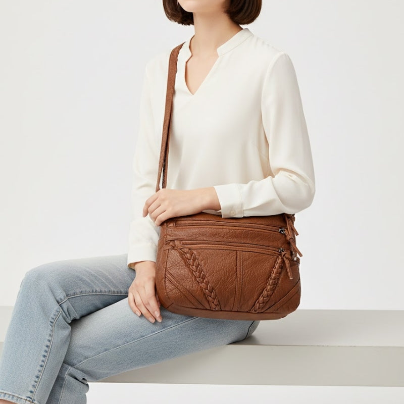 The Axis Glide Crossbody Bag
