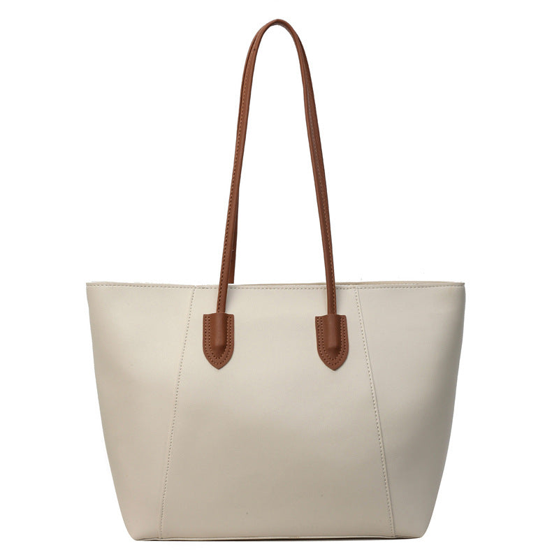 Spring commuter tote bag with textured fabric and large capacity