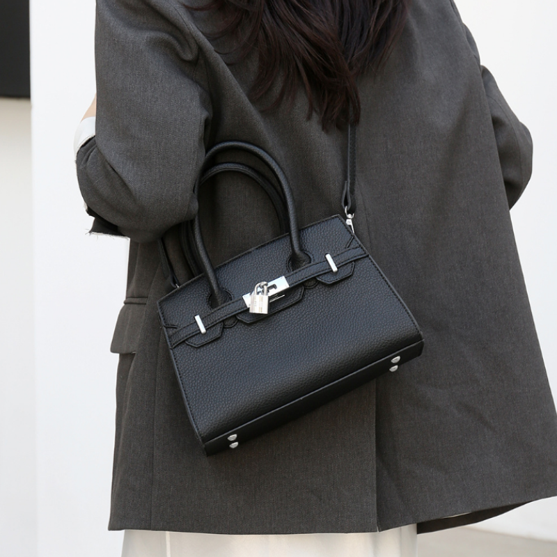 Luxe Lock Structured Handbag