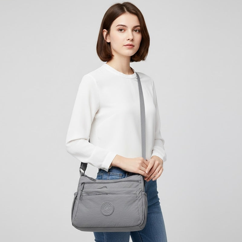 The Silhouette Slide Crossbody Bag