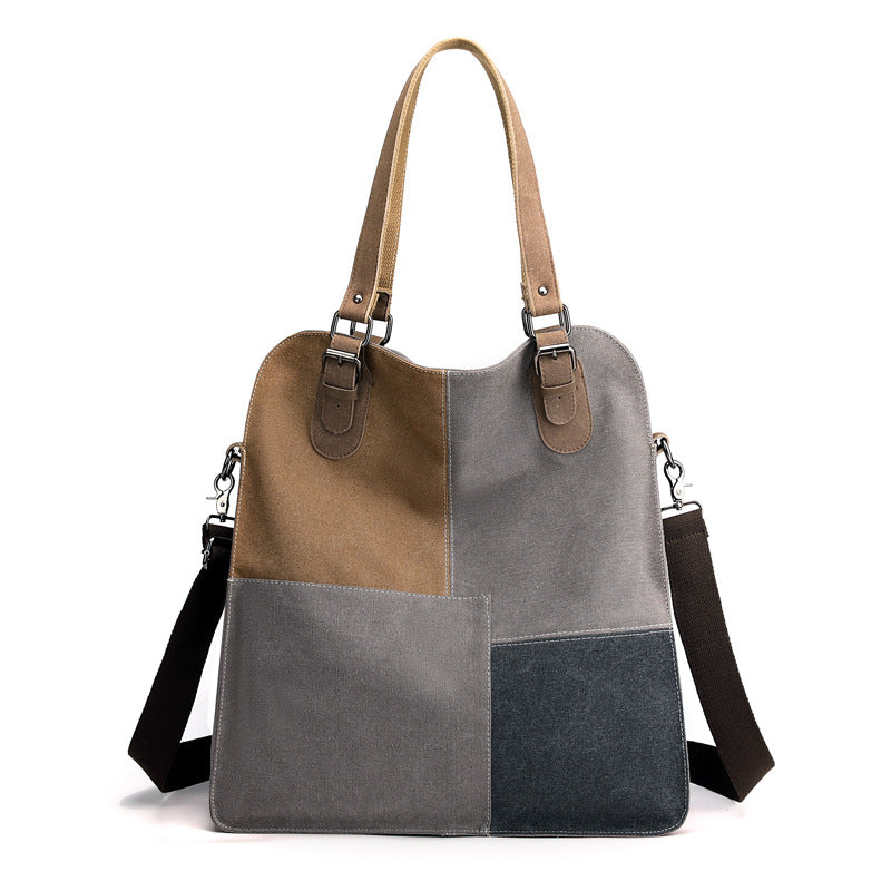 Vintage patchwork canvas shoulder bag with colorful fabric panels
