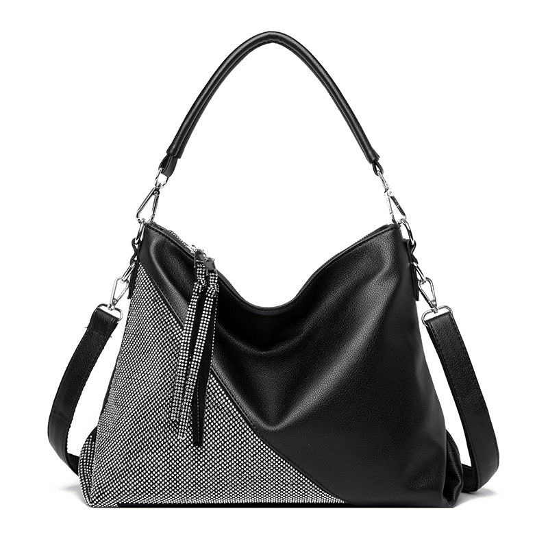 Glamorous large shoulder bag embellished with sparkling stone details
