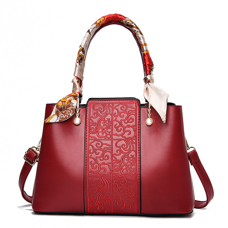 Radiant Red Elegance Handbag